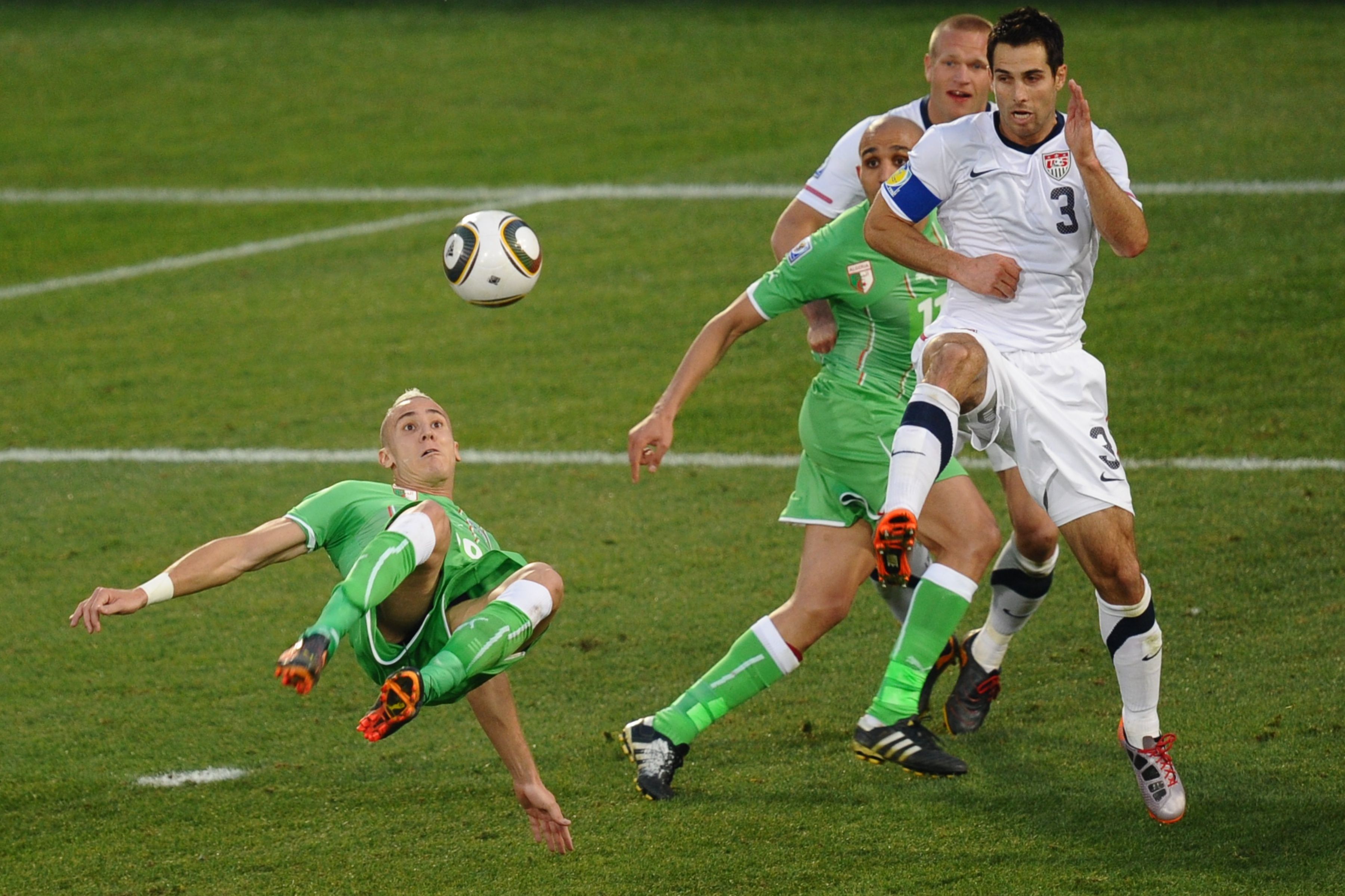Algeria's midfielder Hassan Yebda kicks